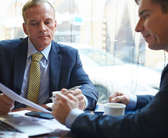 Business owner reviewing paperwork